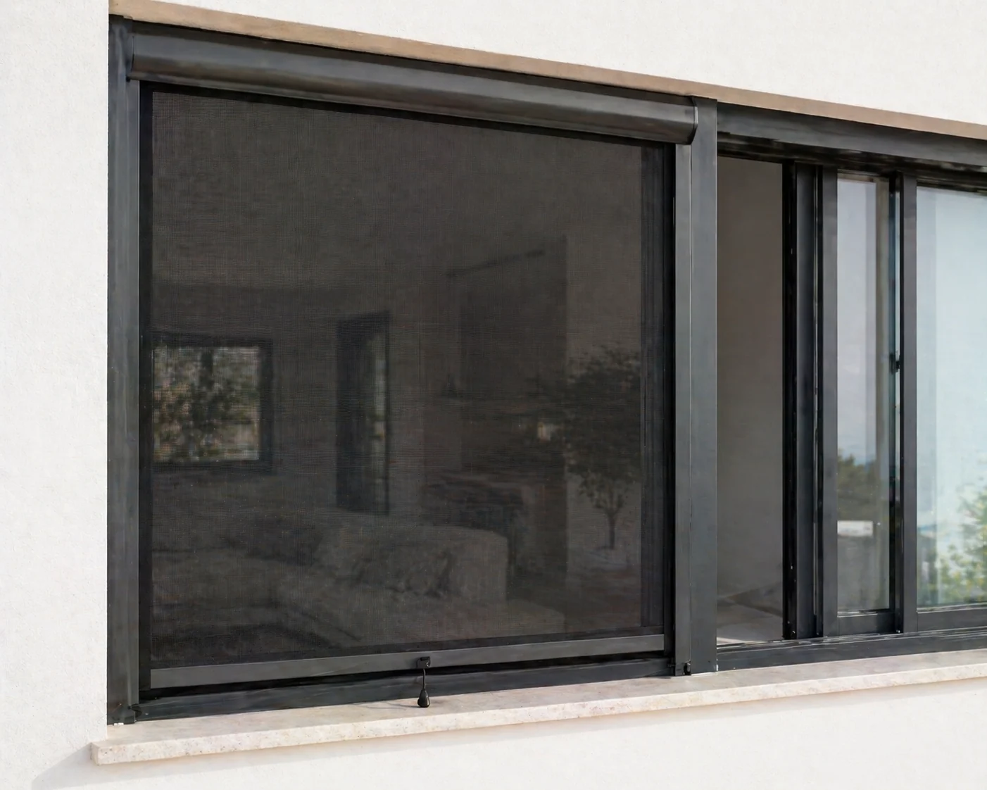 Dark insect screen fitted across a villa window